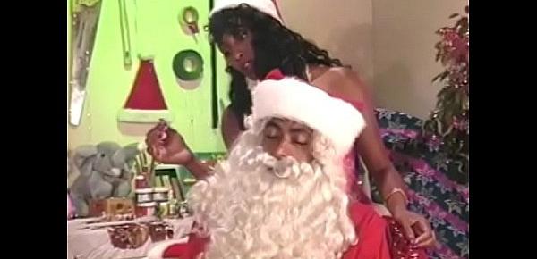  Sexy ass black Santa helper Champagne Pendavis gets pussy pounded by big cock Santa on desk